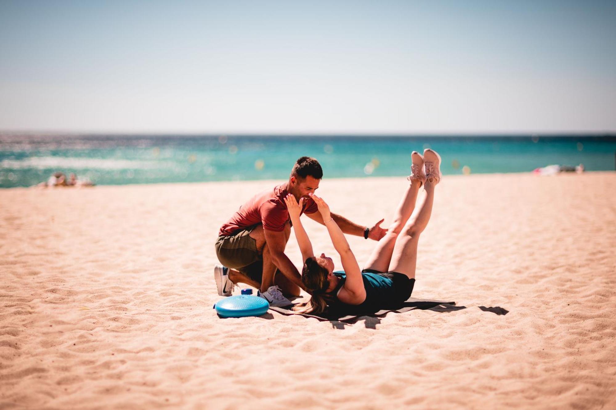 Toison D'Or Hotel Ramatuelle Eksteriør billede A personal trainer working with a client on the beach